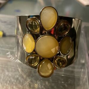 Statement piece, cuff in gold tones & yellow toned stones